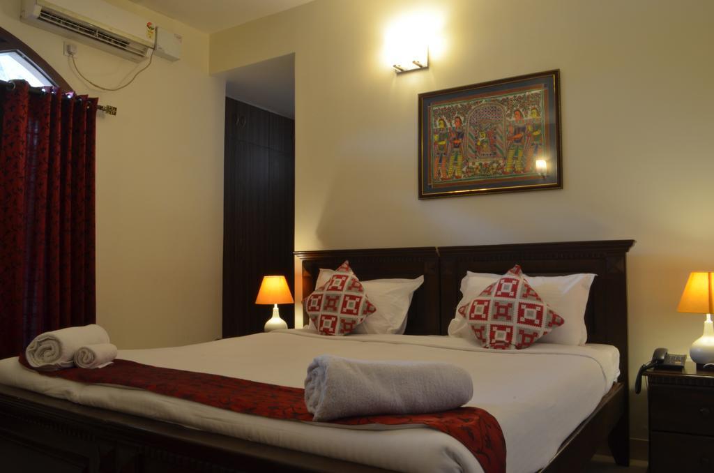 Luxtay Suites Bangalore Chambre photo