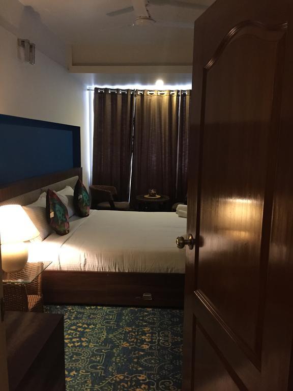 Luxtay Suites Bangalore Chambre photo