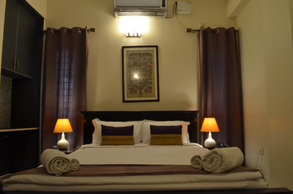 Luxtay Suites Bangalore Chambre photo