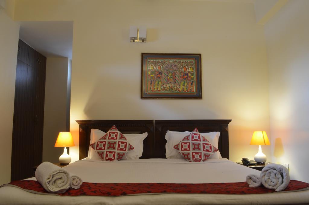 Luxtay Suites Bangalore Chambre photo